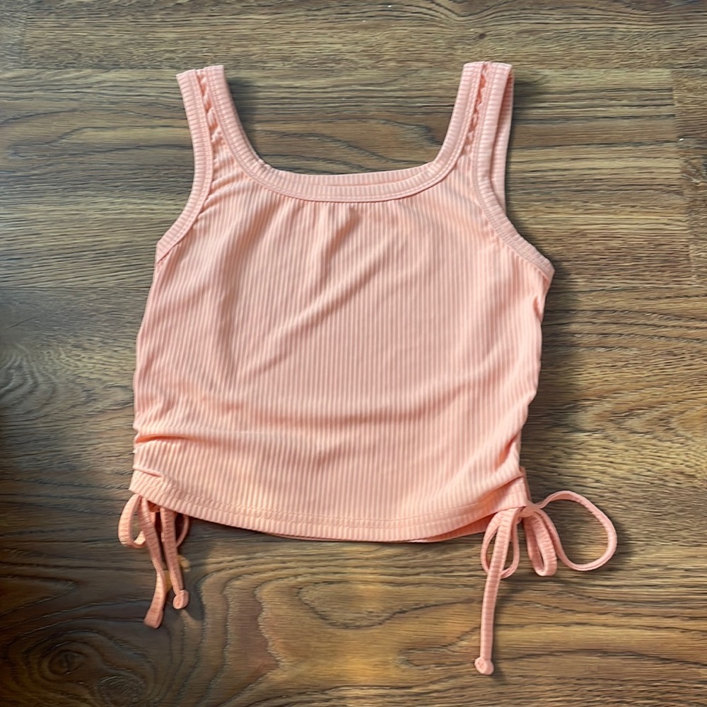 light orange/ peach tank top with ties on the side! size S